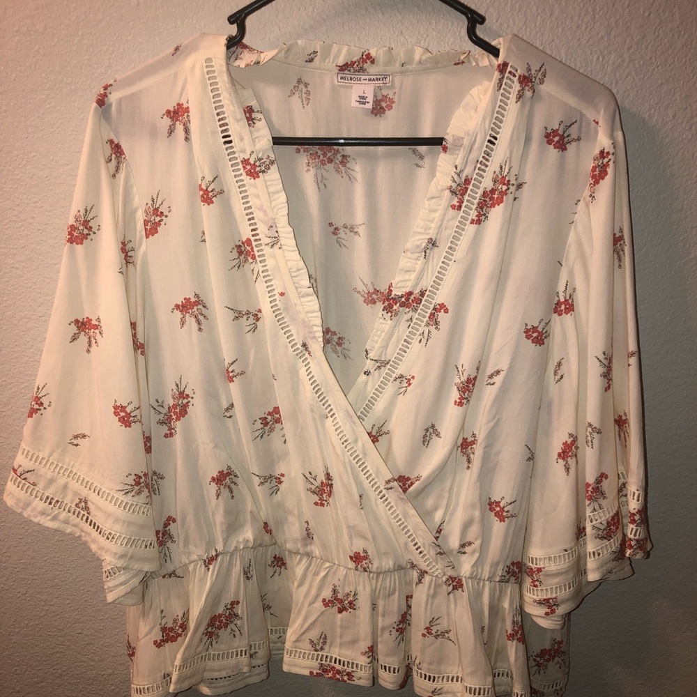 Loose floral patterned peplum top